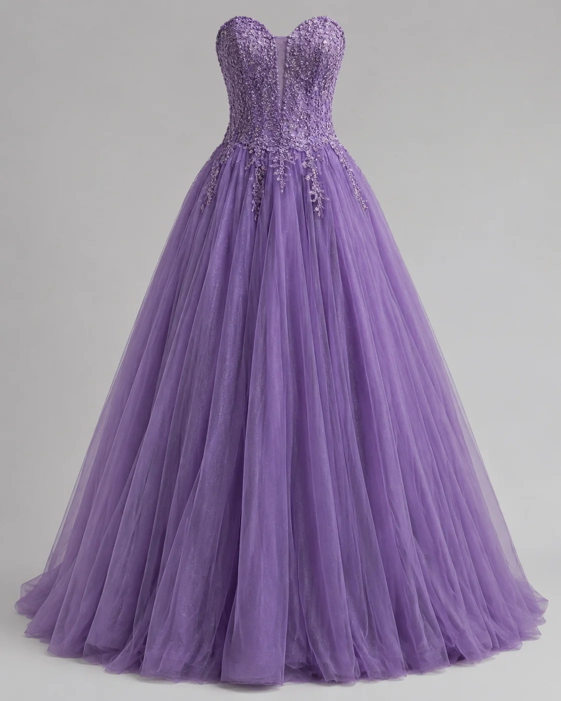A floor-length amethyst-purple ball gown with a full tulle skirt and fitted bodice displayed on a plain light-grey background, no person, clean product styling