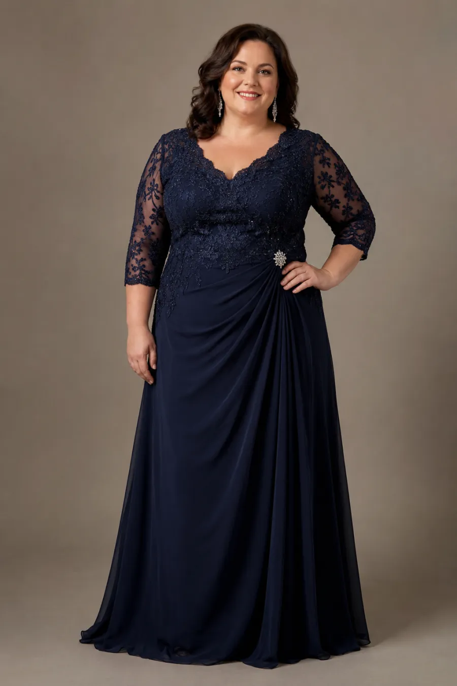 A plus size woman in her forties in an elegant floor-length navy evening gown with three-quarter sleeves, at a softly lit formal event venue, full body